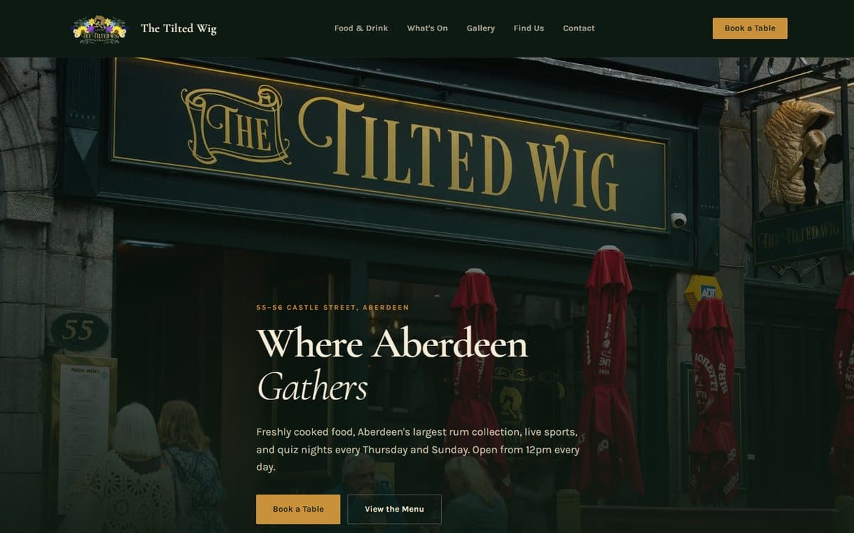 The Tilted Wig website on a desktop screen